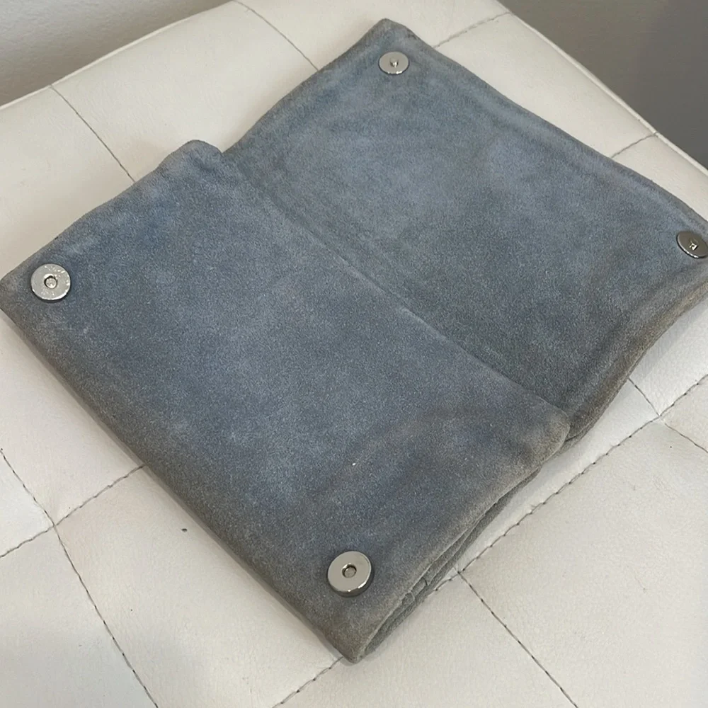 Pale blue clutch with inside zippers and vintage embellishments
